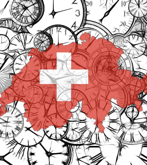 Umriss Schweiz in Rot mit weißem Kreuz und Zahnrädern